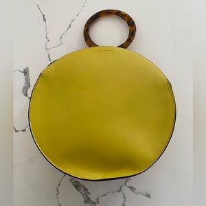 Marks & Spencer round yellow handbag